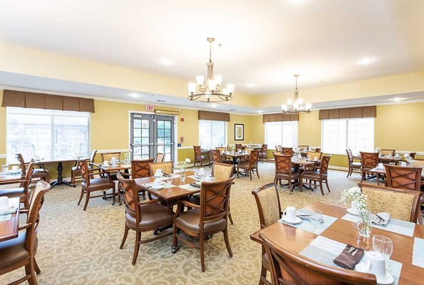 Dining area with tables set for meals