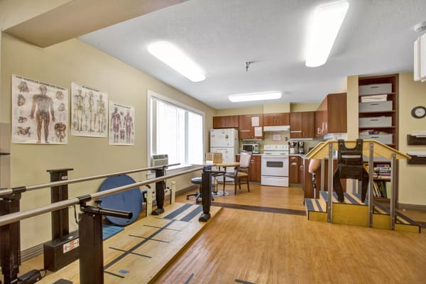 Rehabilitation therapy room with exercise equipment