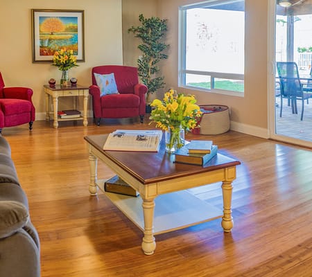 A cozy common area with seating and decor