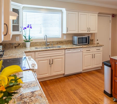 Bright kitchen with modern appliances and decor