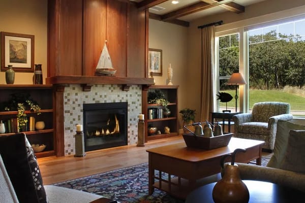 Spacious living room with a fireplace and large windows
