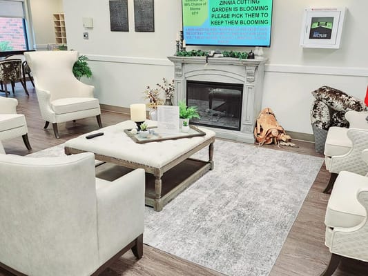 Cozy common area with comfortable seating and fireplace