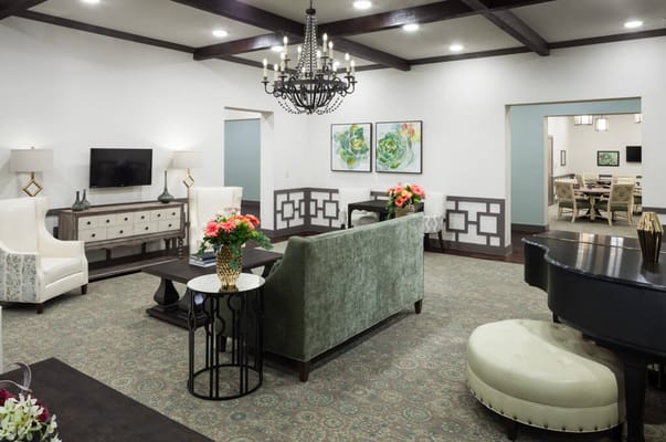 Bright common area with comfortable seating and decor