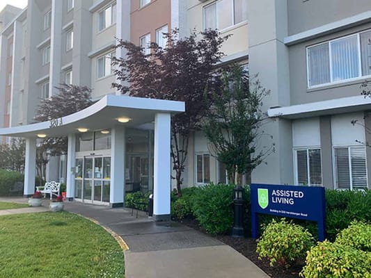 Exterior view of Assisted Living facility with landscaping