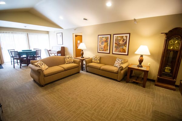 Bright and inviting common area with seating and decor