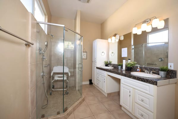 Well-lit bathroom with modern fixtures and accessible features