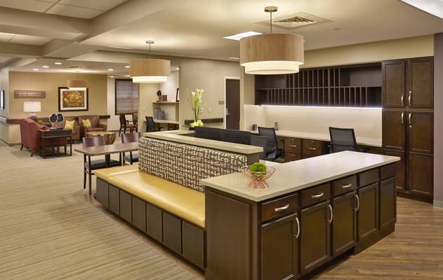 Welcoming reception area with seating and a service counter