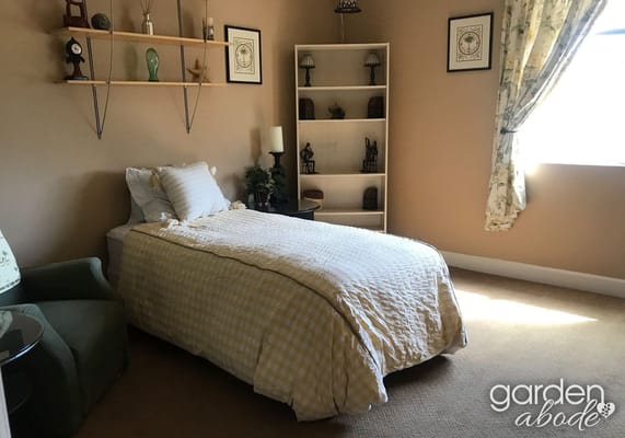 Cozy private resident room with a bed and decor