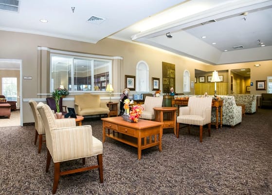 Cozy lounge area with seating and decorative elements