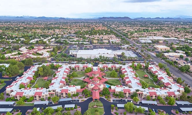 Aerial photograph of Ridges at Peoria Senior Living complex showcasing landscaped grounds and surrounding areas.