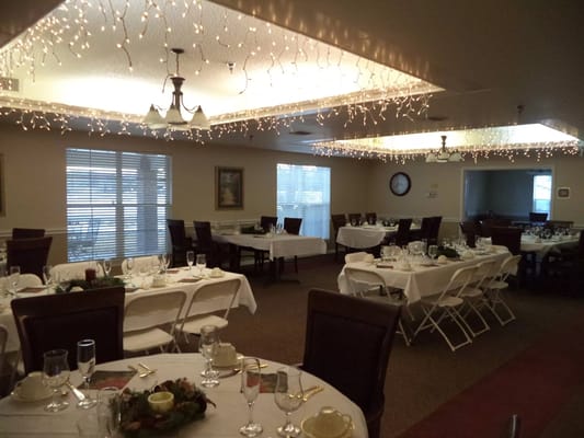 Dining area set up for a festive meal with decorations