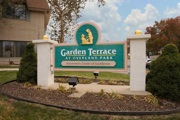 Sign for Garden Terrace at Overland Park with an Alzheimer's Center of Excellence designation