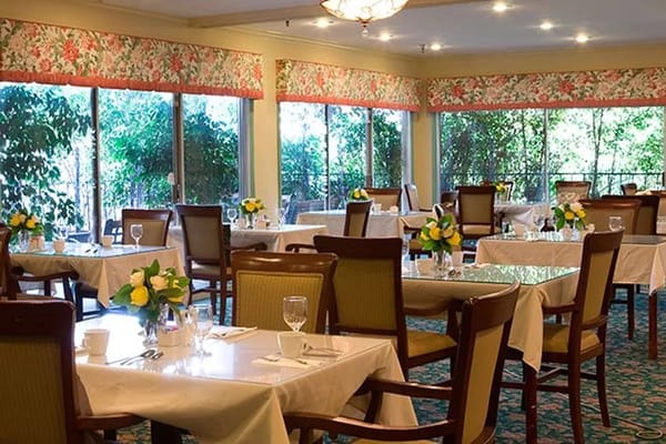 Dining area with tables set for a meal