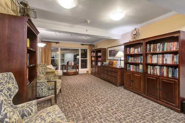 Interior common area with bookshelves and seating