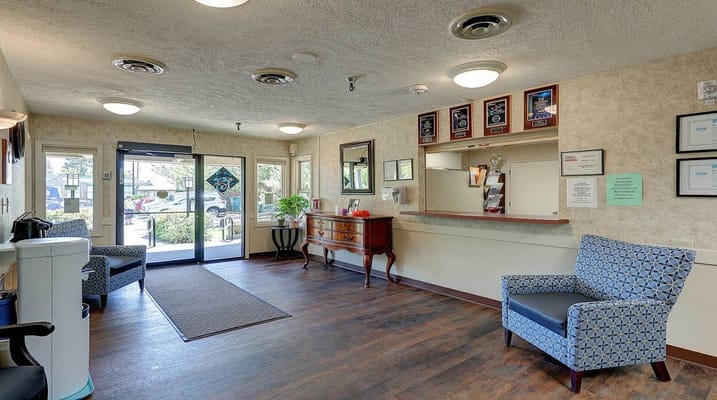 Welcoming reception area with seating and front desk