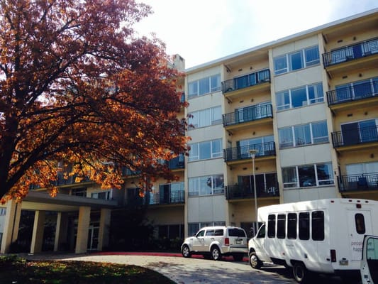 Front entrance of Gateway Vista with autumn tree