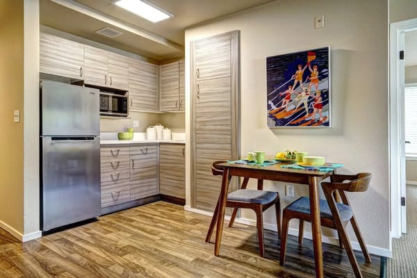 A cozy kitchen area in a resident suite