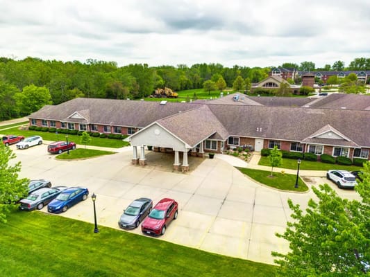 Aerial view of Glen Oaks Alzheimer's Special Care Center entrance and parking area