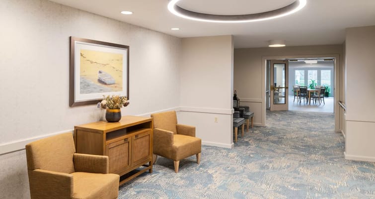 Bright common area with seating and artwork