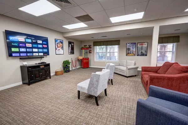 Common area with seating and a television