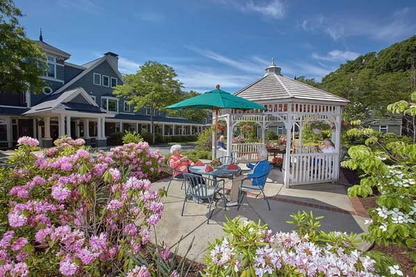 Residents enjoying the outdoor space with flowers