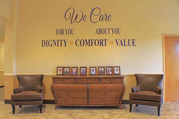 Interior space with comfortable chairs and a motivational wall statement