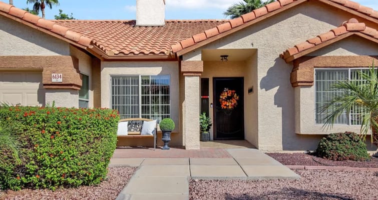 Exterior view of a care home with landscaping