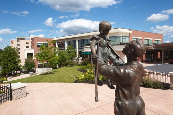 Outdoor view of facility with a statue in front