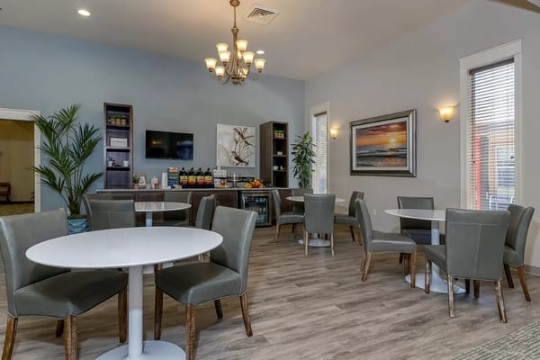 Bright common area with modern seating and decor