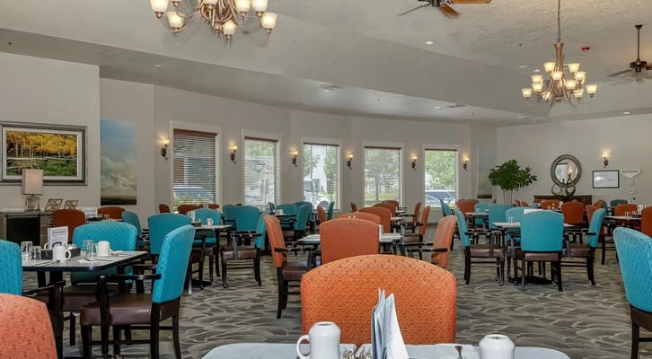 Interior view of a dining area with tables and chairs