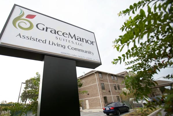 Exterior signage of Grace Manor Suites assisted living community