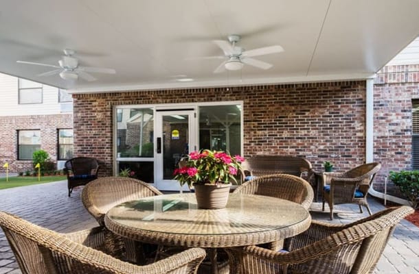 Outdoor seating area with a view of the building
