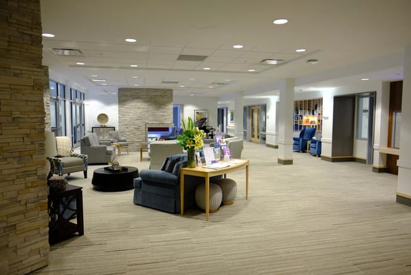 Bright common area with seating and decor