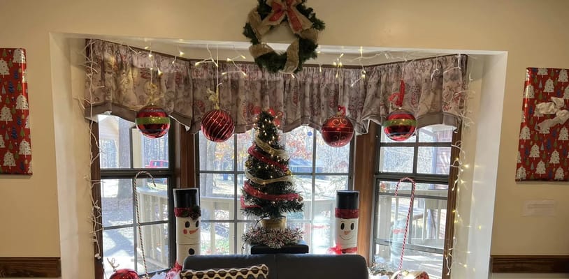 Christmas tree and holiday decorations in common area