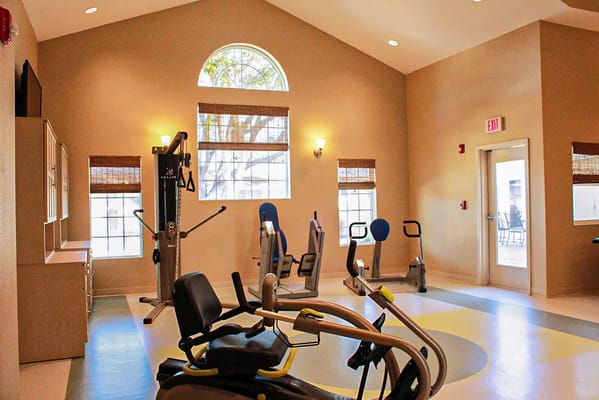 Interior view of a fitness area with exercise equipment