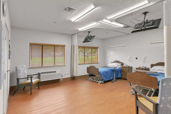 Interior view of a shared resident room with two beds