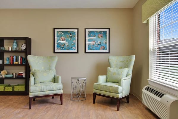 Inviting interior seating area with framed artwork