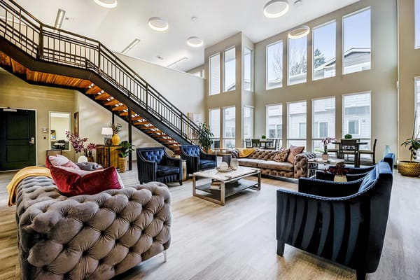 Spacious lobby with modern furniture and large windows