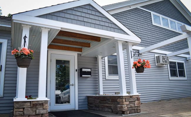 Entrance of Halldale Manor with flower pots