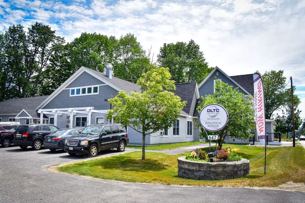 Exterior view of Halldale Manor building and sign