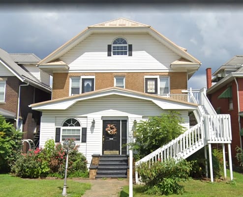 Exterior view of a two-story assisted living facility.