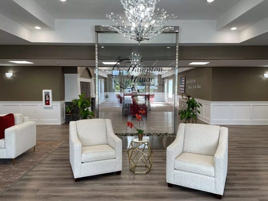 Bright common area with seating and decorative features