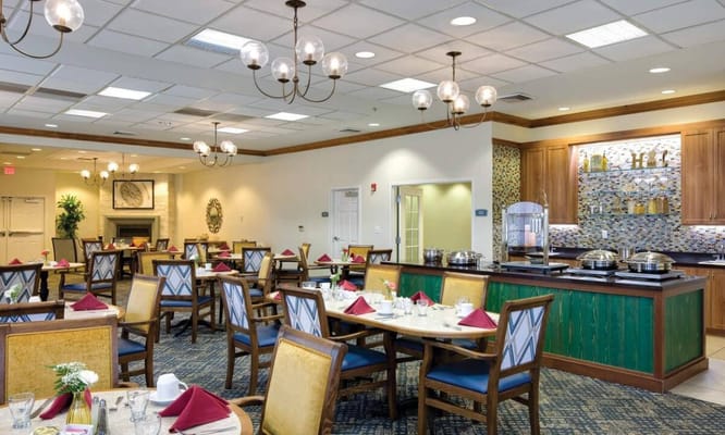 Dining room with tables set for a meal
