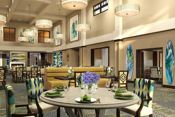 Bright dining room with elegant decor and table settings