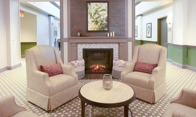 Cozy common area with comfortable seating by the fireplace