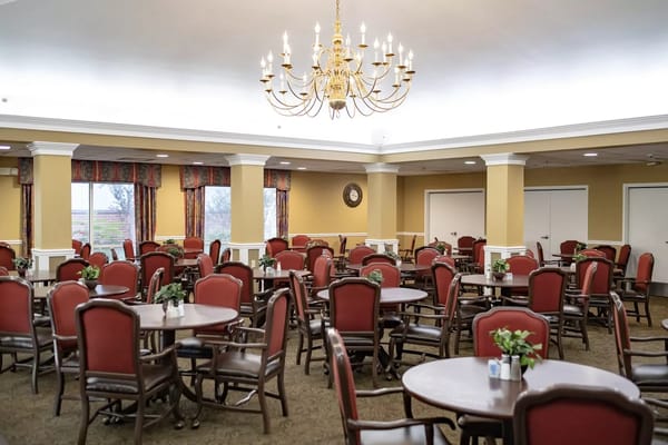 Dining room area with tables and chairs
