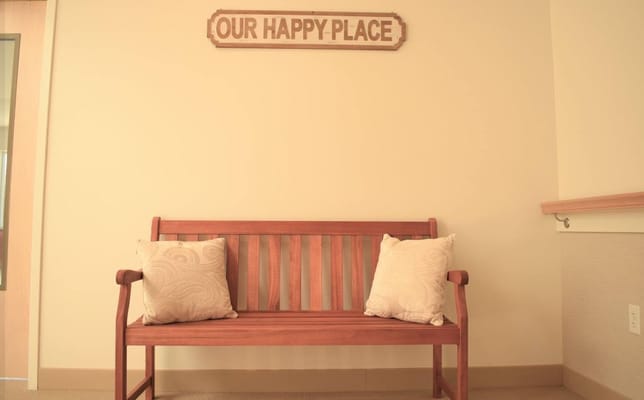 A cozy bench with decorative pillows in a pleasant interior space