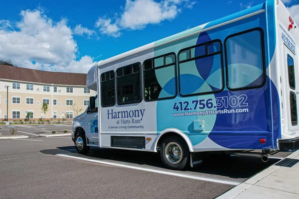 Facility transport van parked outside the building