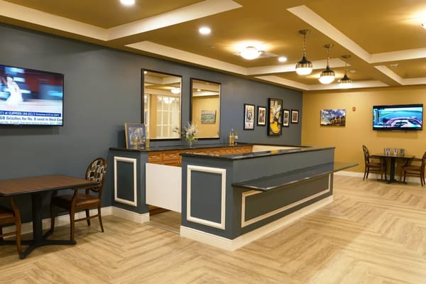 Common area with seating and TVs