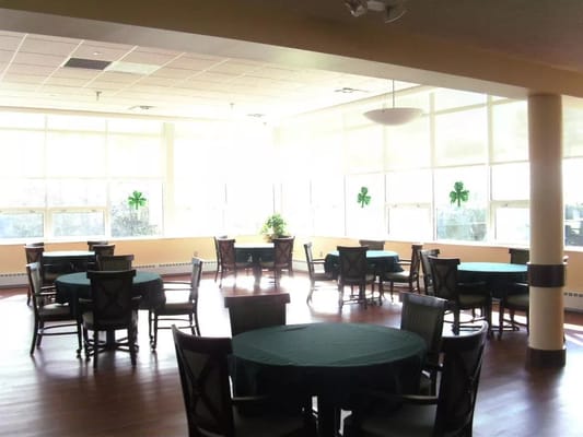 Bright dining area with round tables and chairs